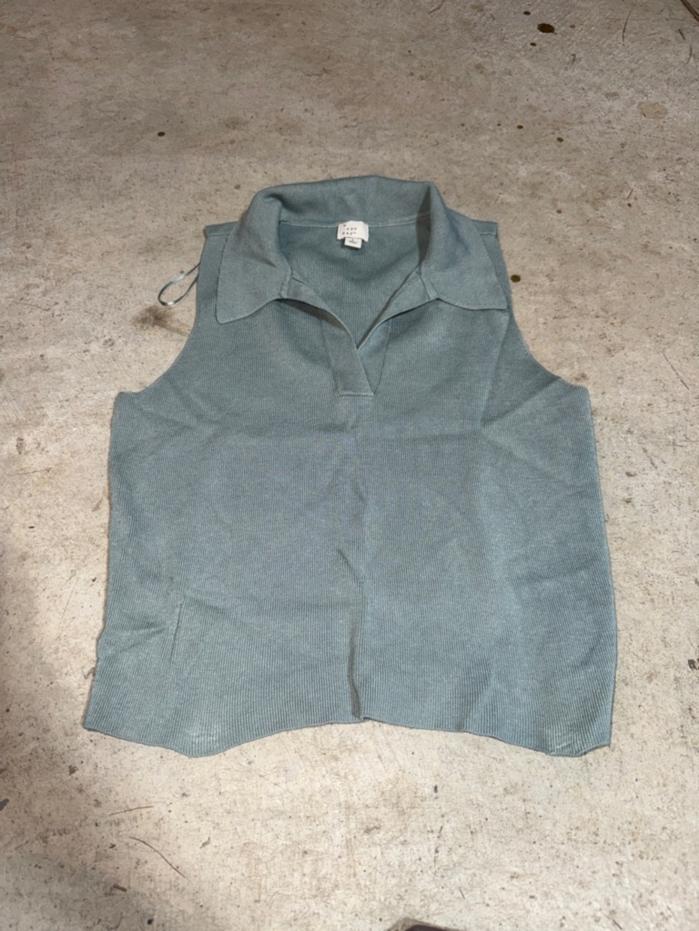 a new day Sleeveless Polo Tank Top